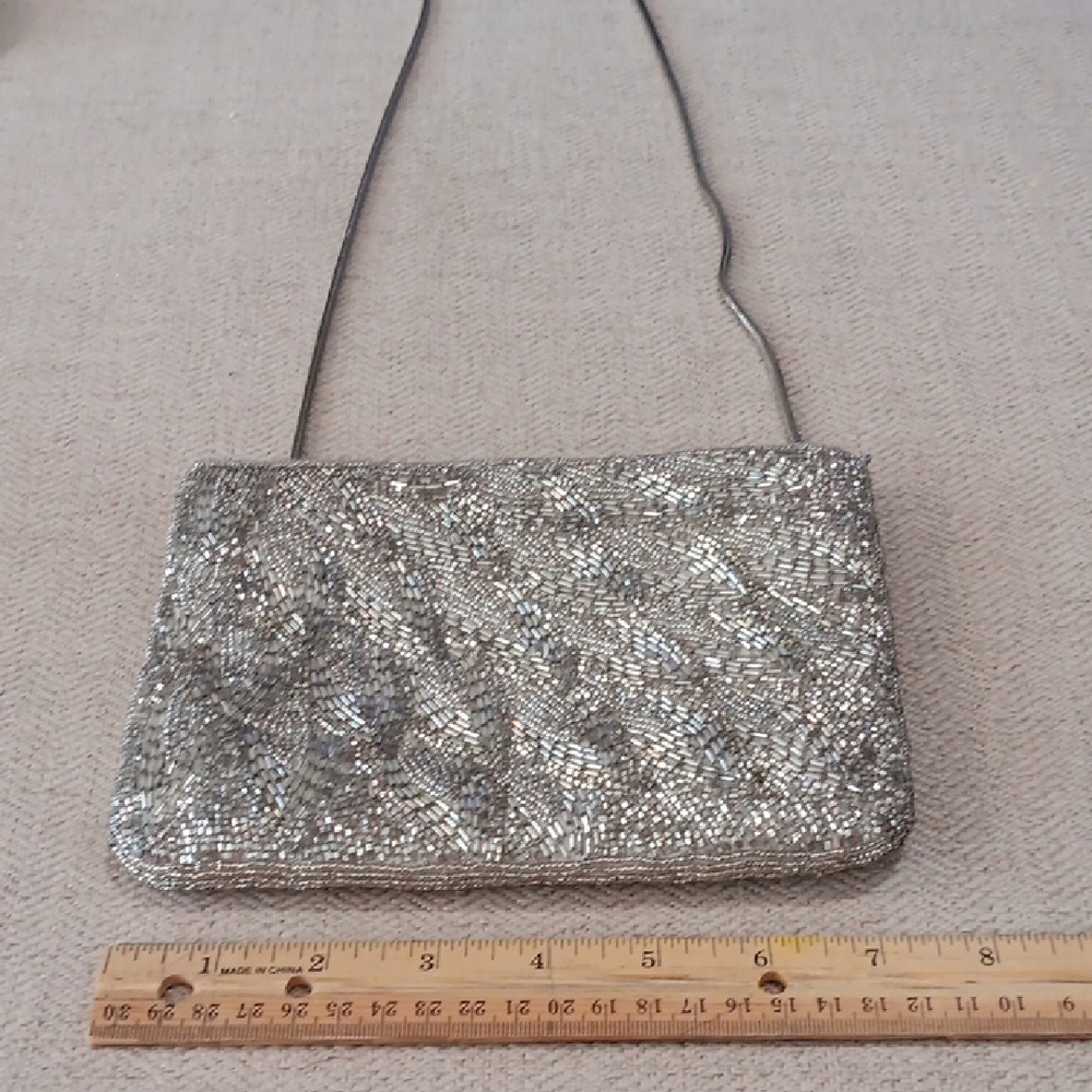Elegant Silver Beaded Clutch